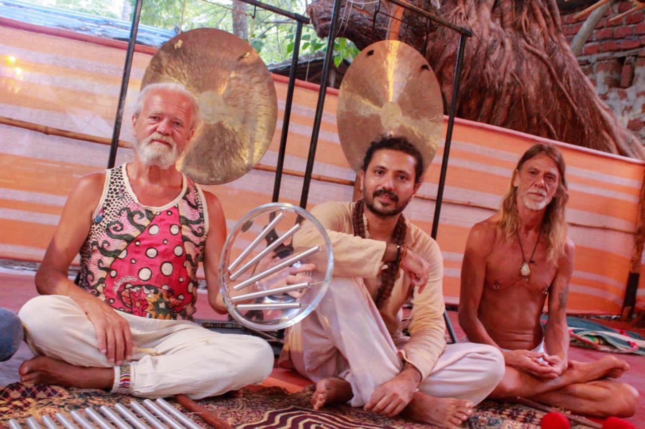 Yogi Rohan seated with fellow practitioners during a sound ceremony