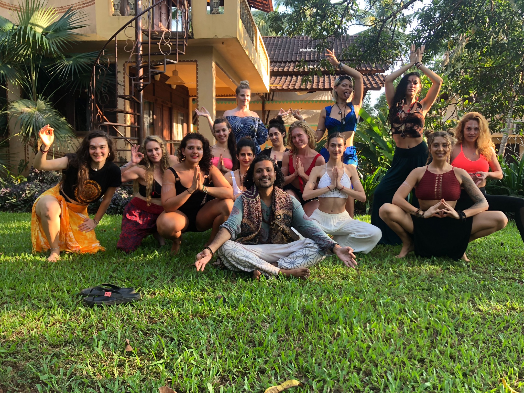 Yogi Rohan leading a group practice outside in a retreat setting