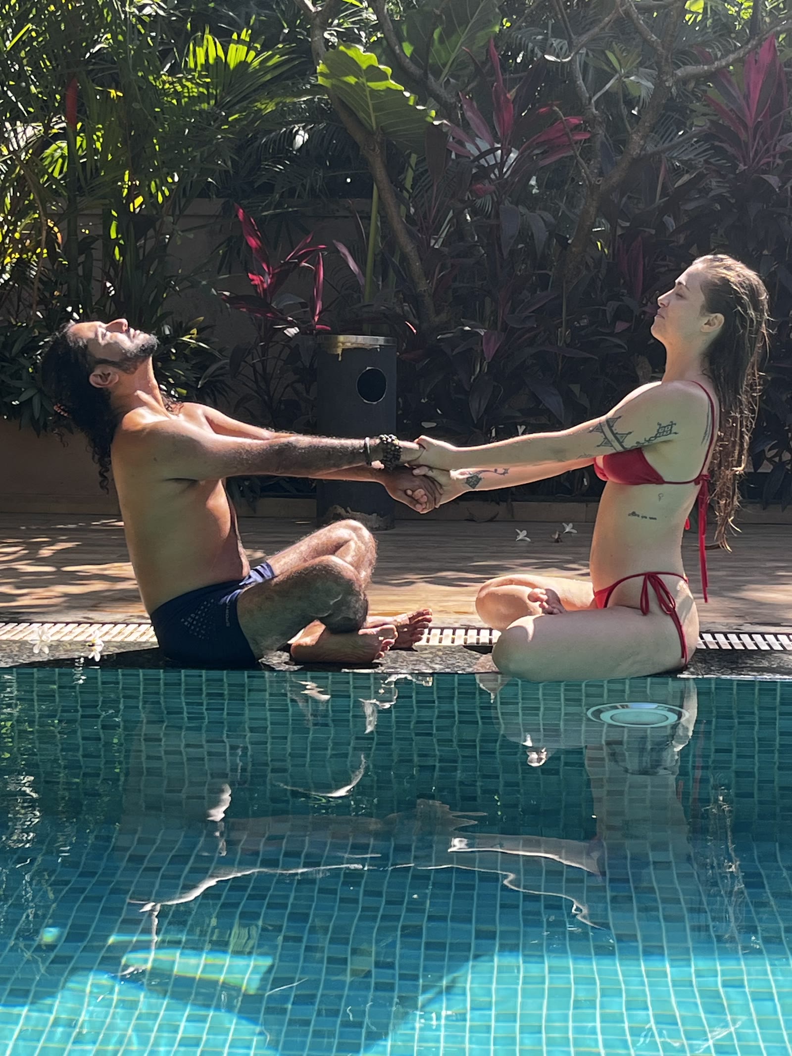Yogi Rohan guiding a conscious connection practice by the pool